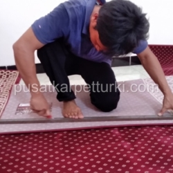 potong karpet masjid